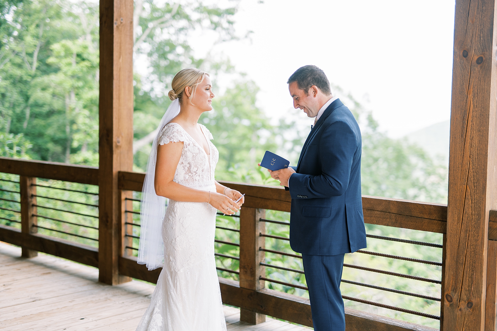 bride and groom exchange private vows on balcony before Blue Ridge Mountains Elopement in Georgia