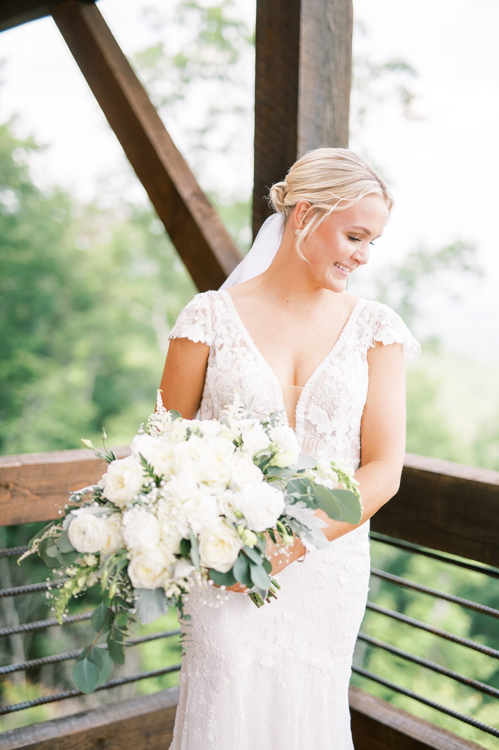 bride holding her classic bridal bouquet 