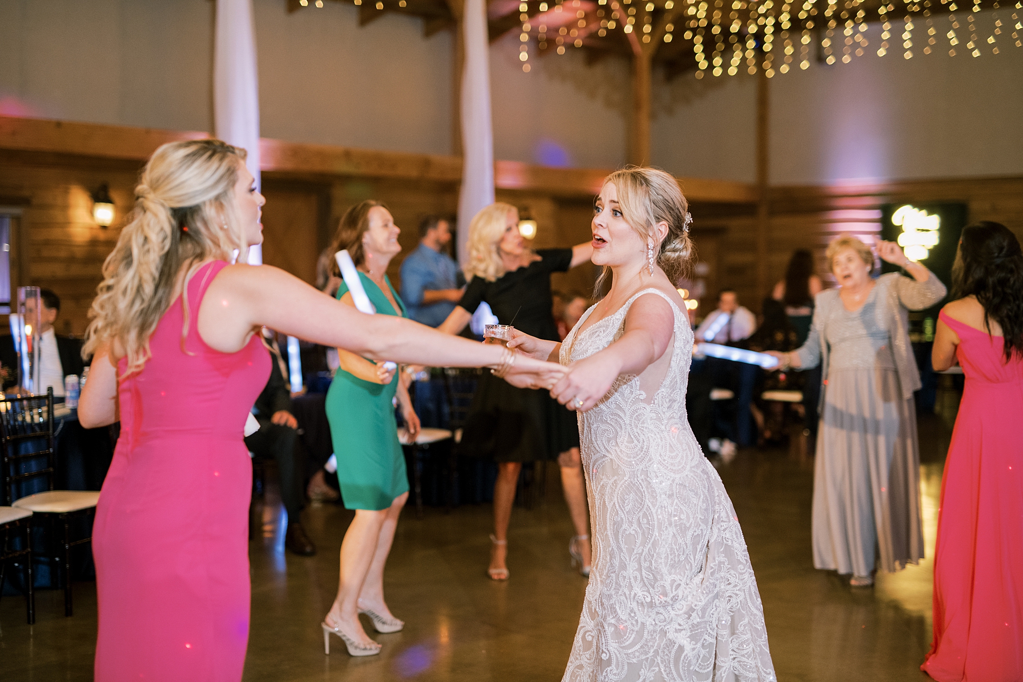 bride and bridesmaids dance