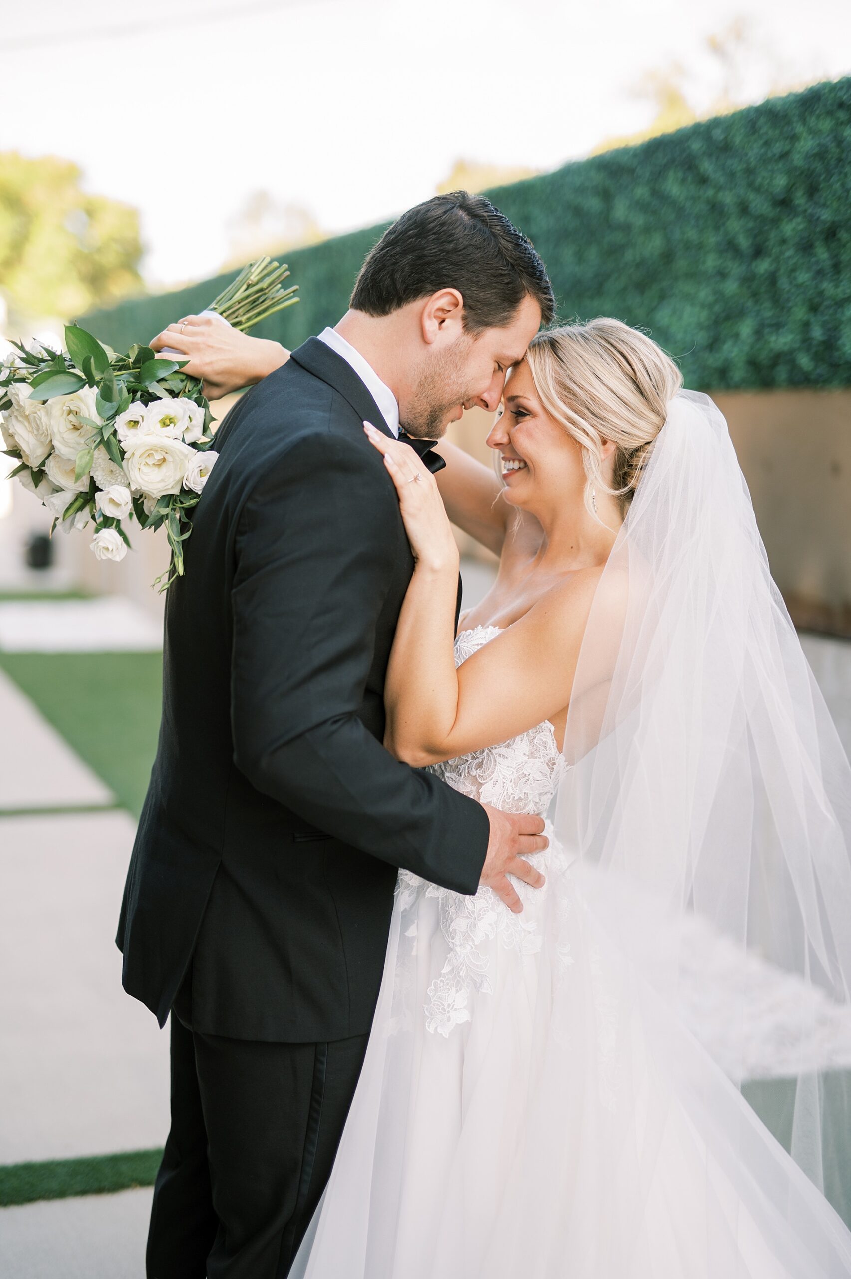 Nashville wedding photographer, Kera Photography, captures timeless wedding portaits of couple in the courtyard 