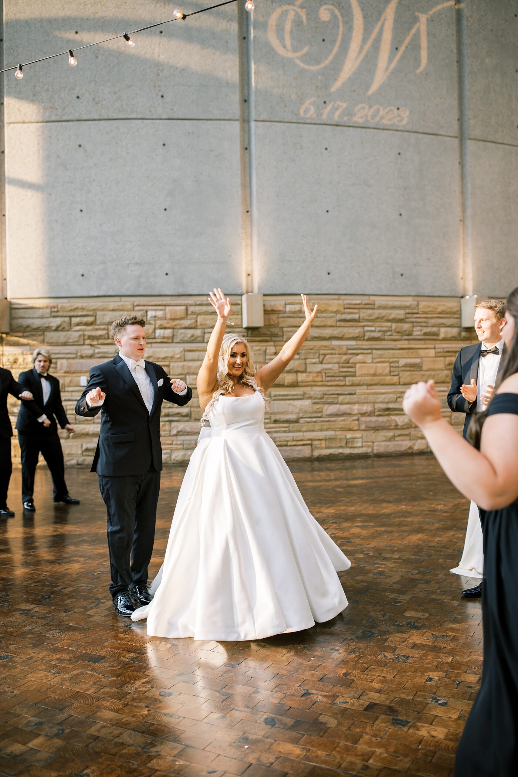 newlyweds enter wedding reception at The Country Music Hall of Fame
