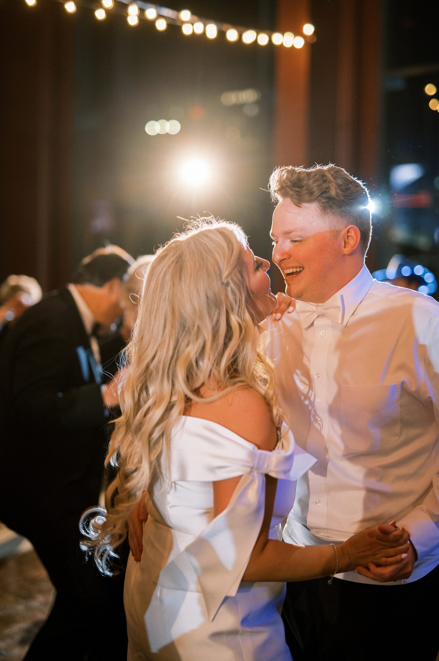 newlyweds laugh and dance at Elegant Nashville Wedding 