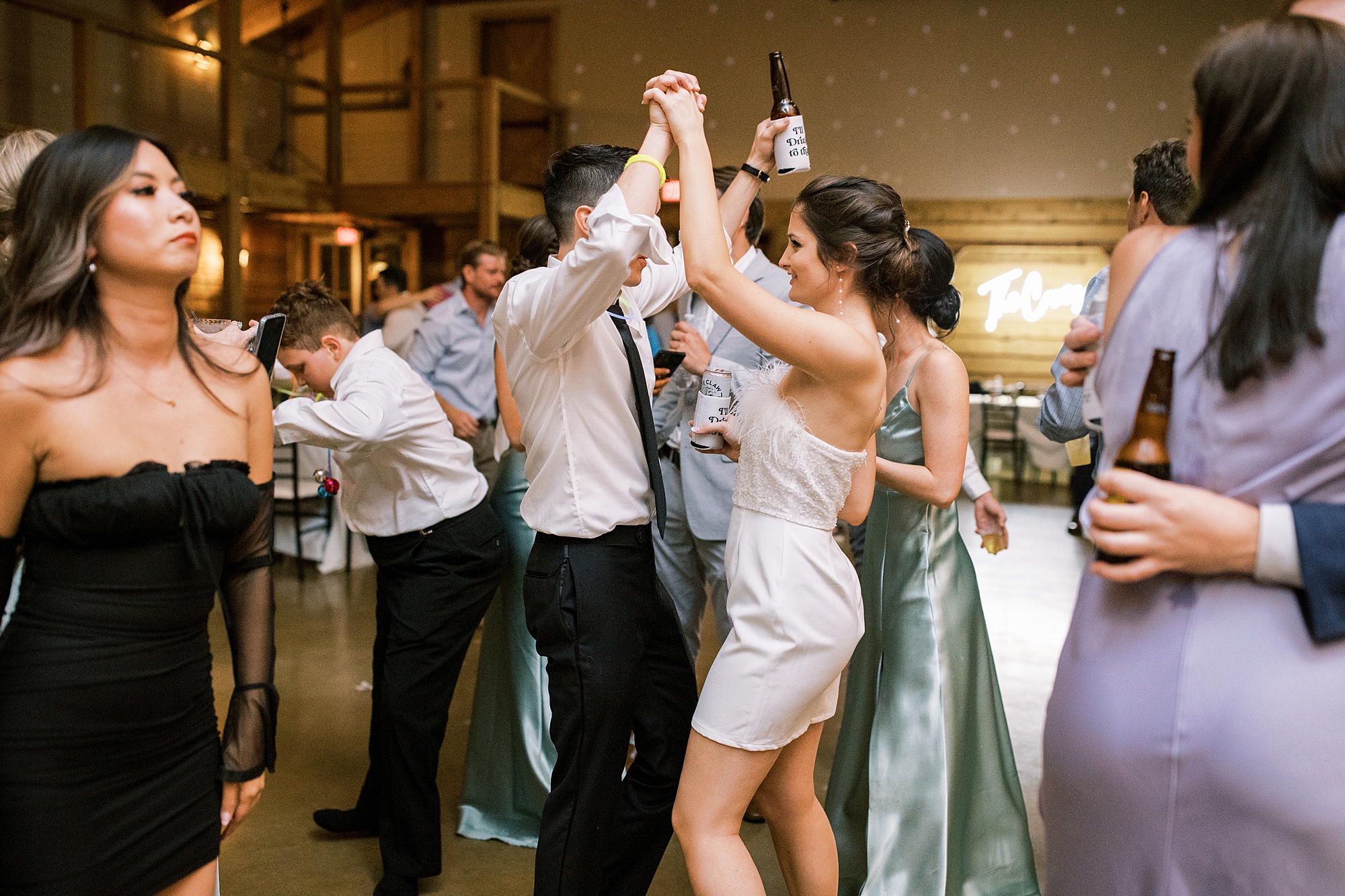newlyweds dance at The Barn at Sycamore Farms wedding reception