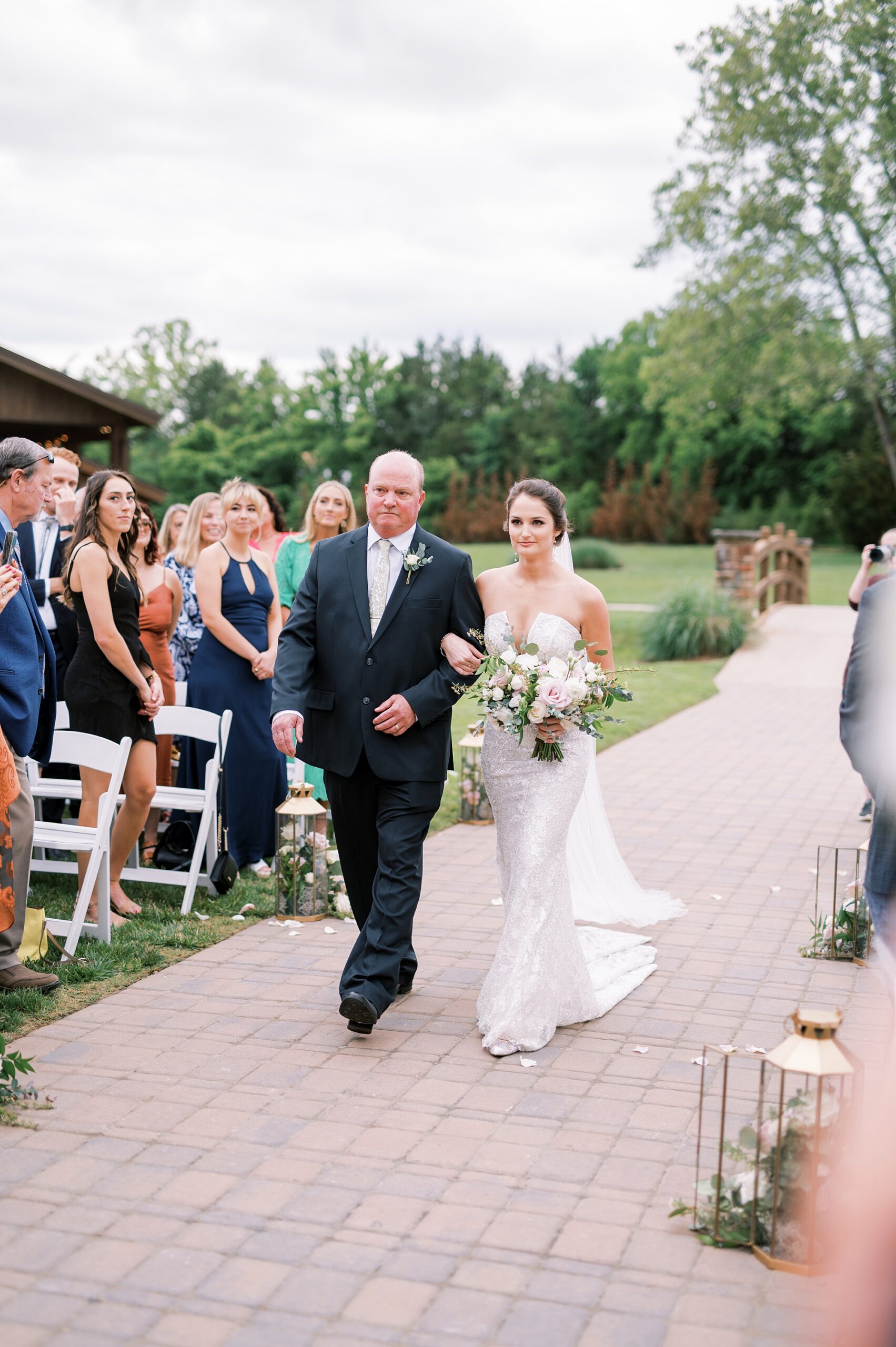 father walks his daughter the aisle 