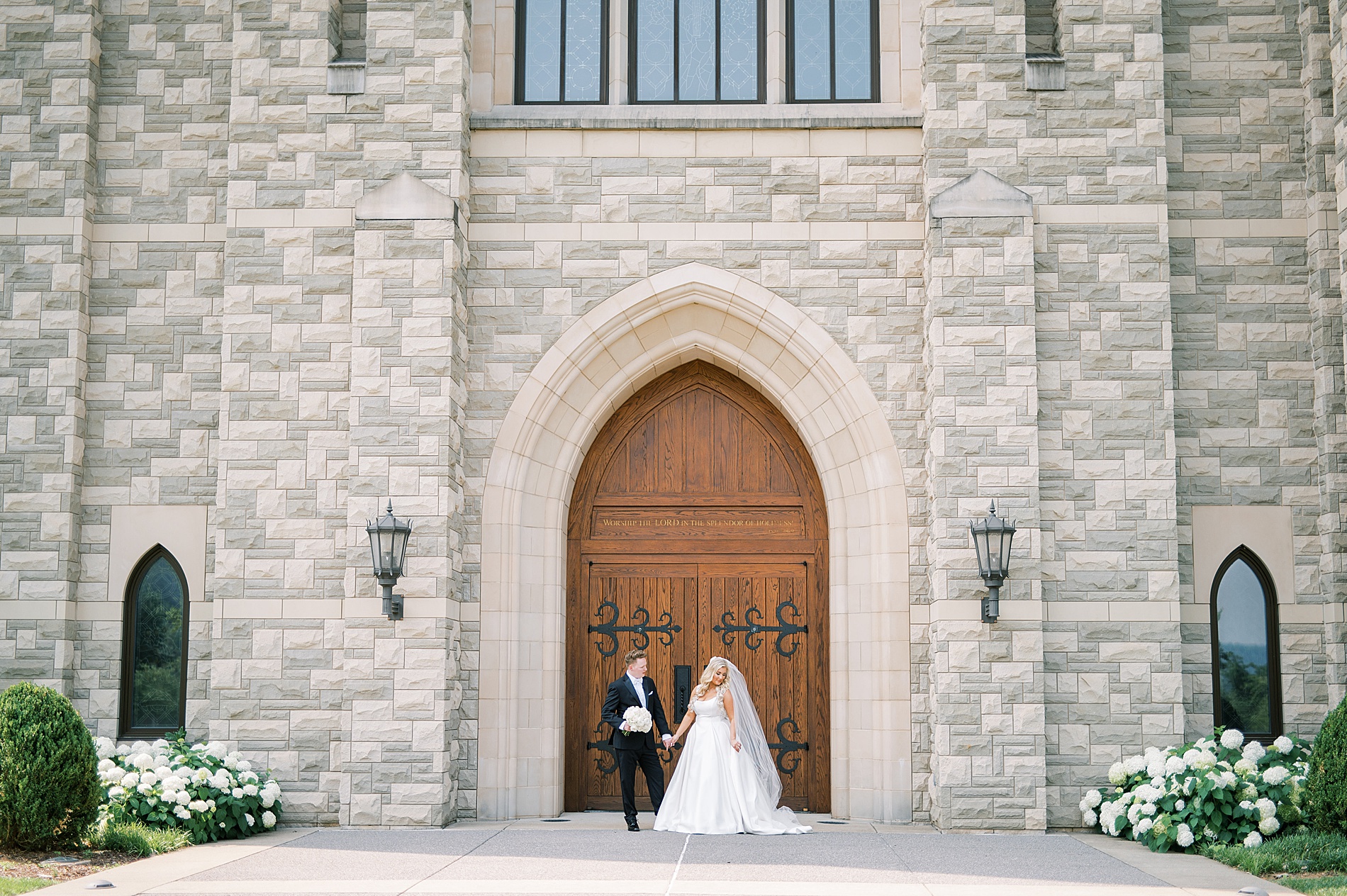 bride and groom outside of Covenant Presbyterian Church in Nashville