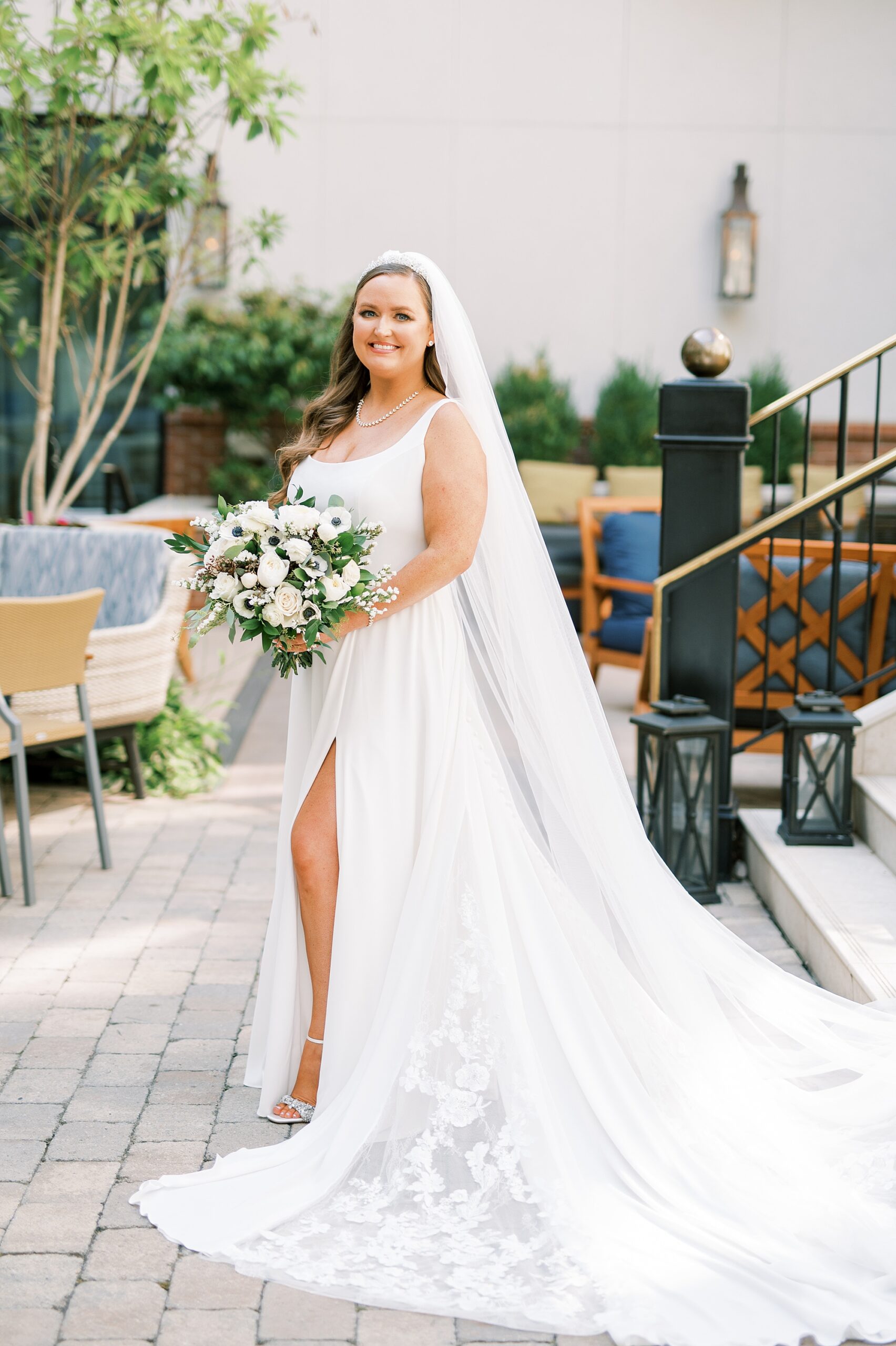 bride in classic, chic wedding dress with white bouquet from Timeless Downtown Franklin Wedding at Harpeth Hotel 