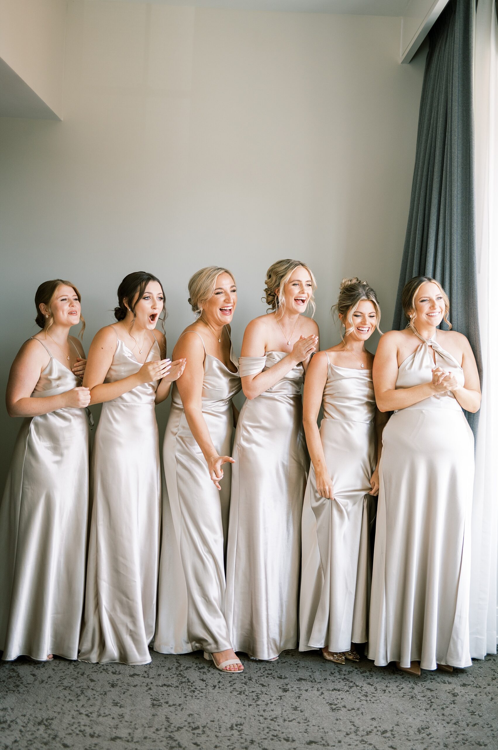 bridesmaids reaction to seeing bride before Timeless Downtown Franklin Wedding 