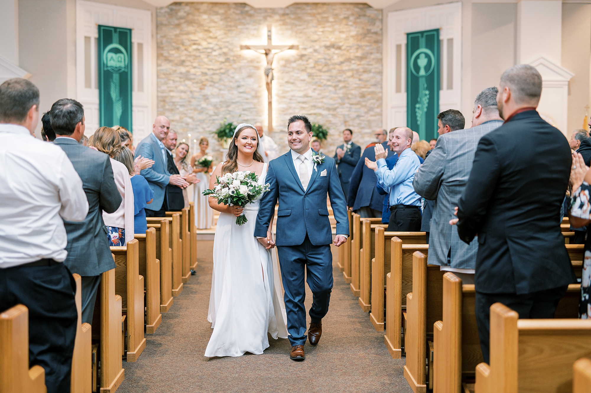 newlyweds exit church after wedding ceremony