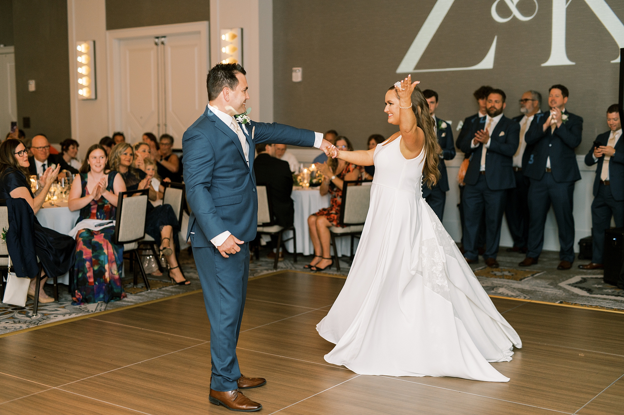 candid newlywed portraits of first dance