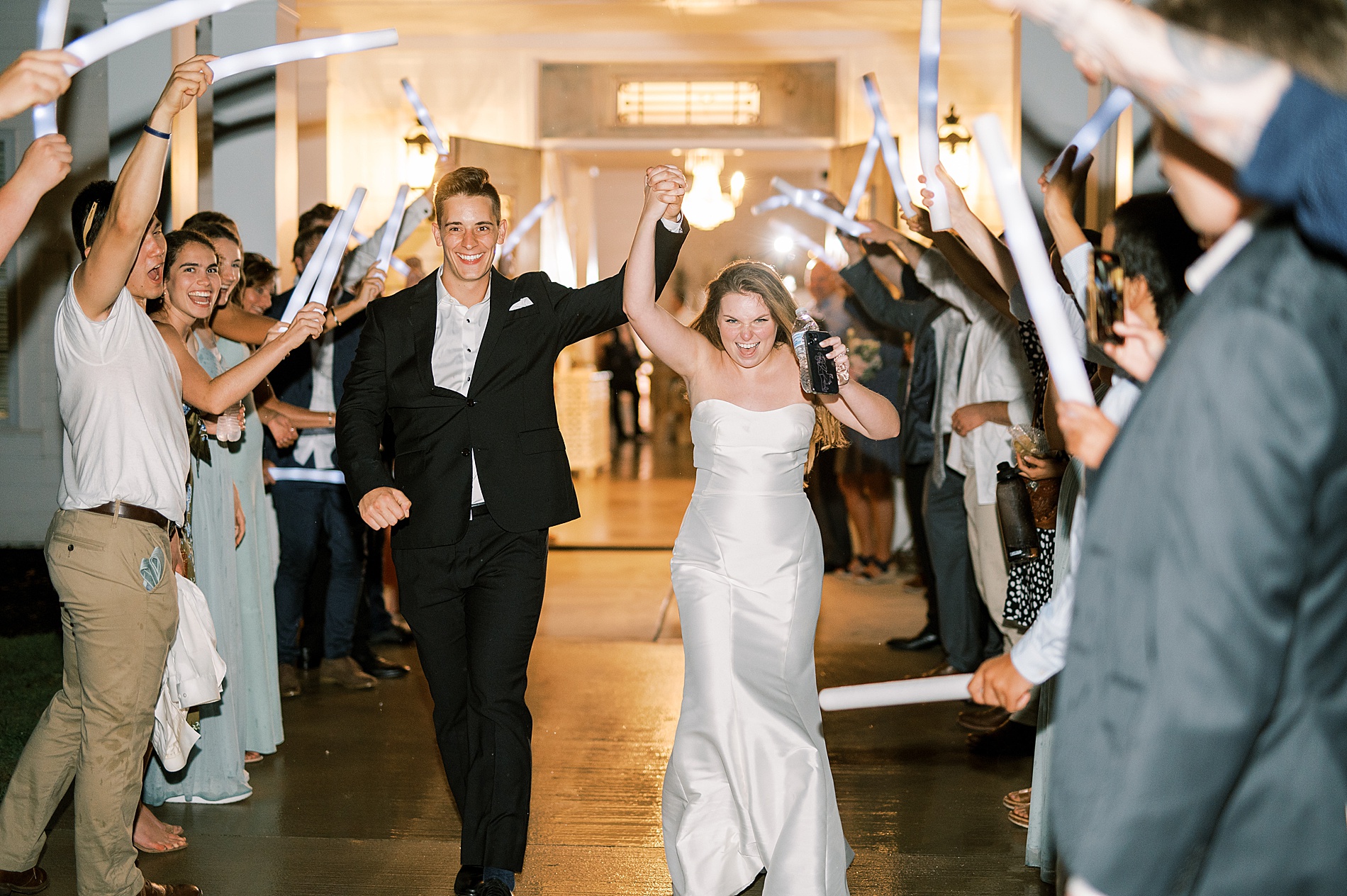 newlyweds exit wedding reception 