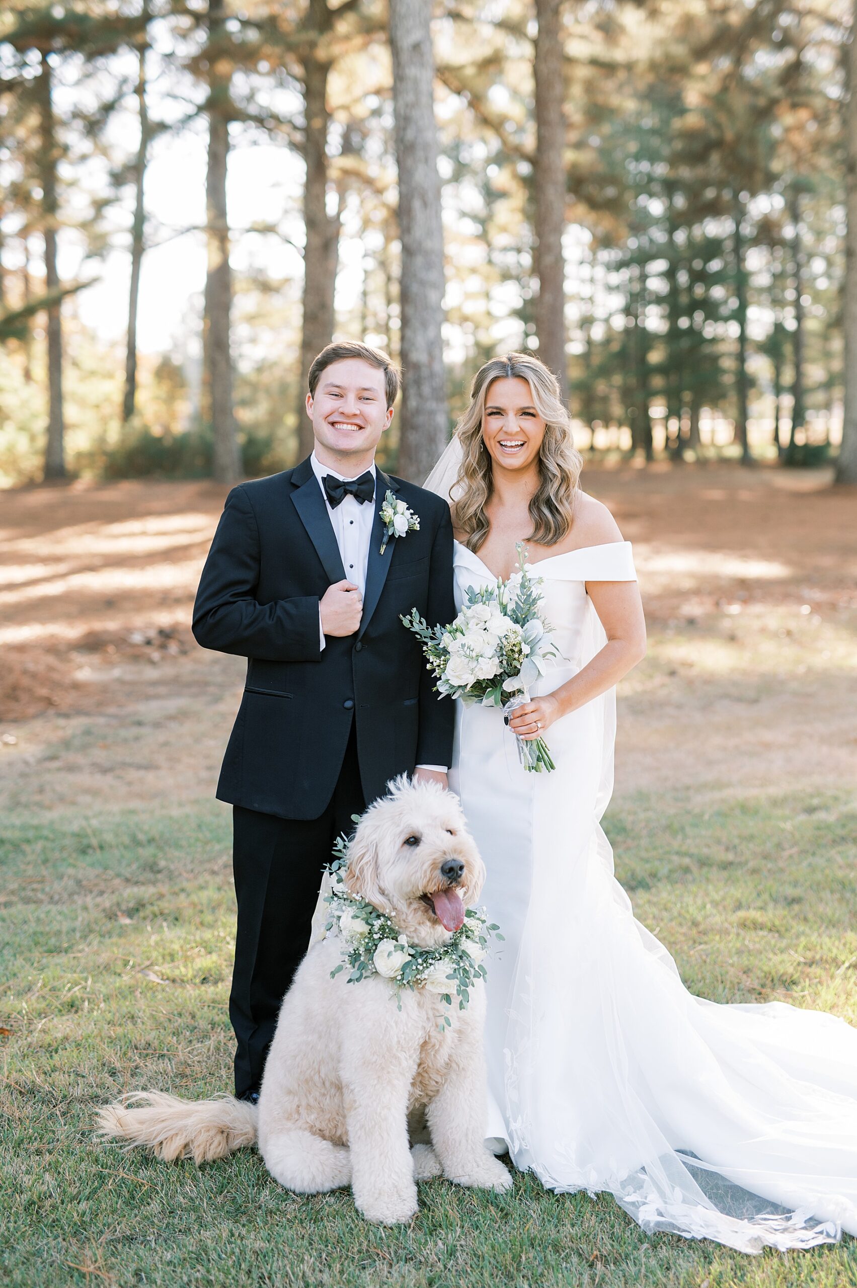 newlyweds with their dog after wedding ceremony at The Witt House