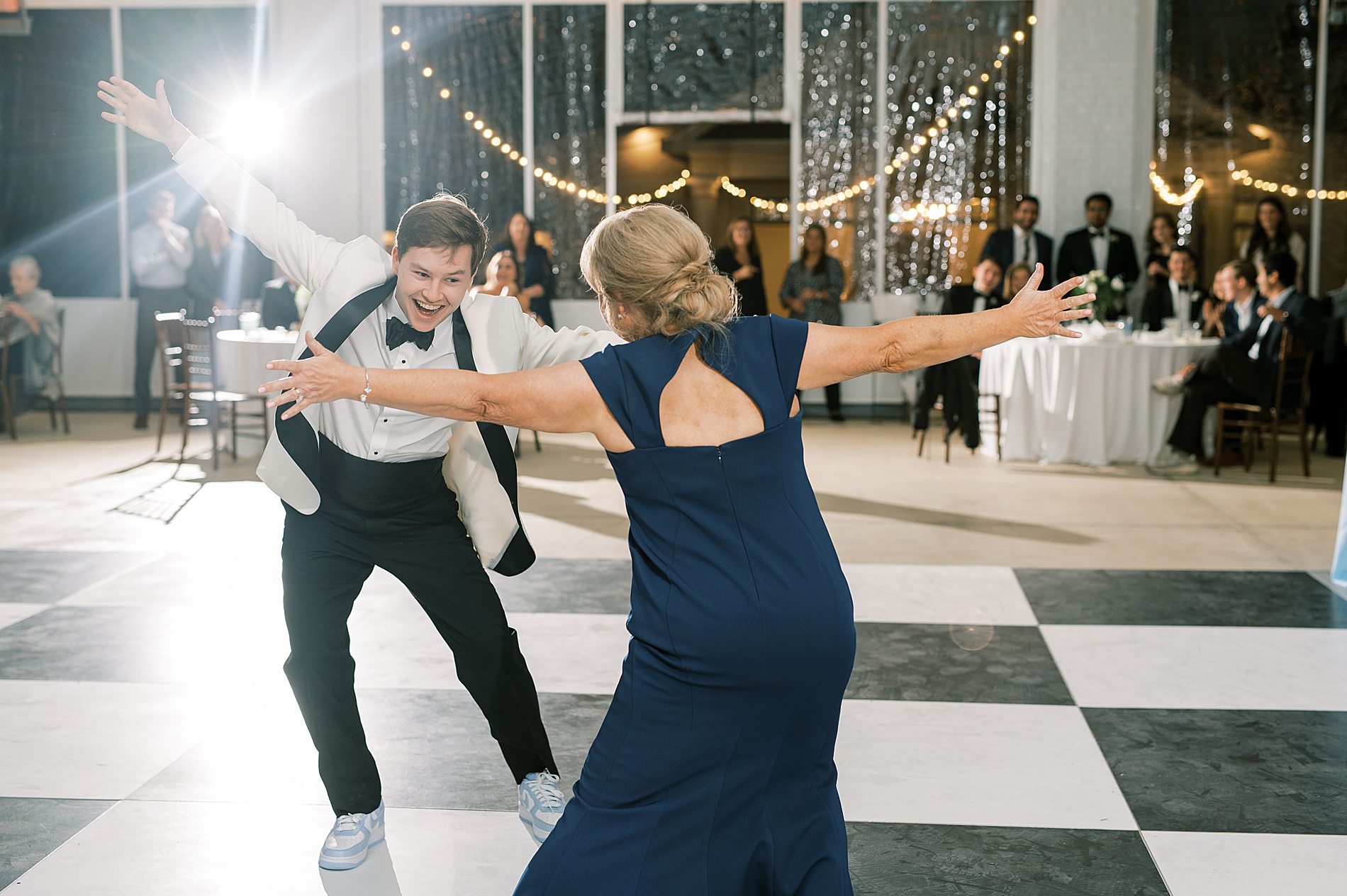 fun dance between groom and mother