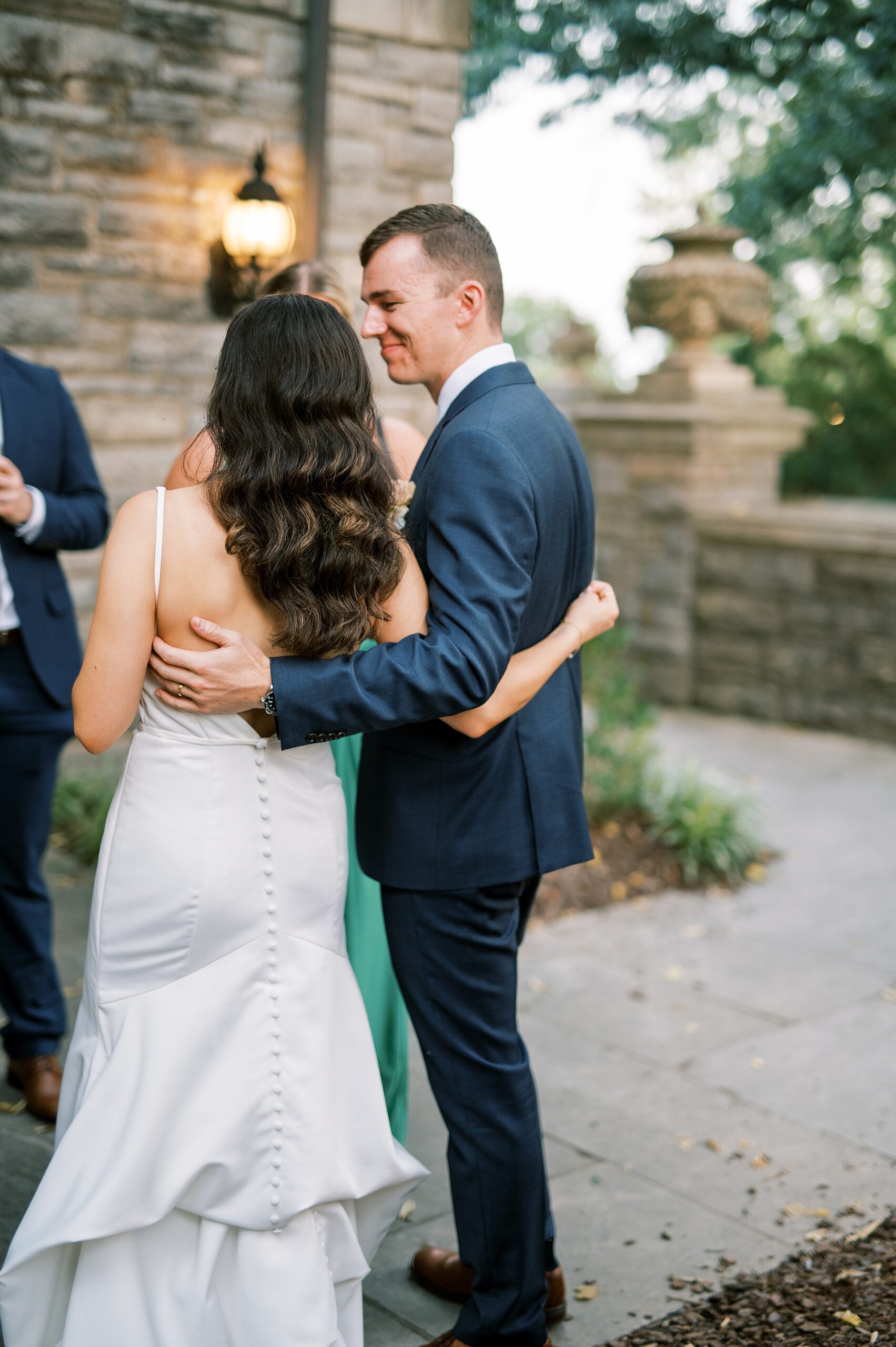 newlyweds at cocktail hour from Intimate Wedding at Cheekwood Estate and Gardens