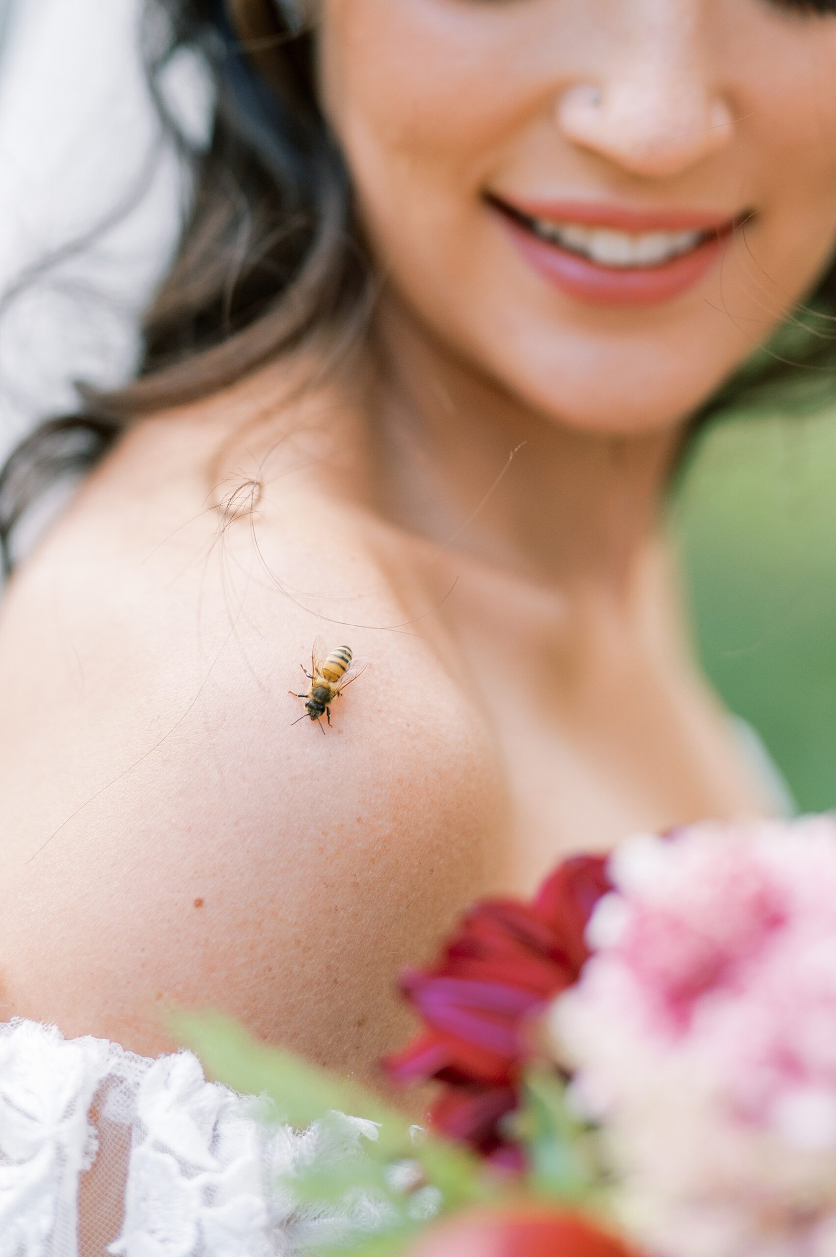 honeybee lands on bride's shoulder
