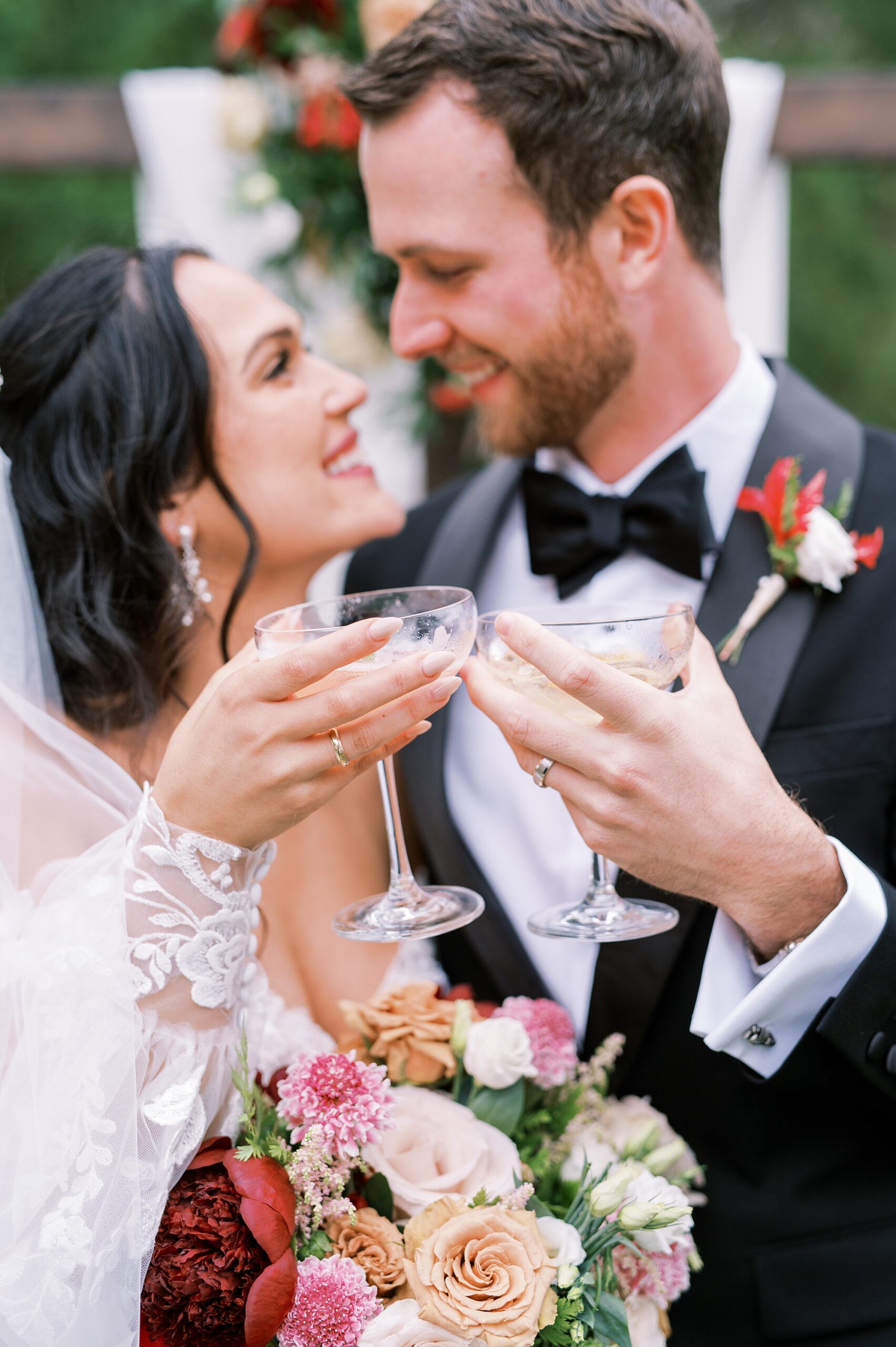 newlyweds toast at wedding reception 