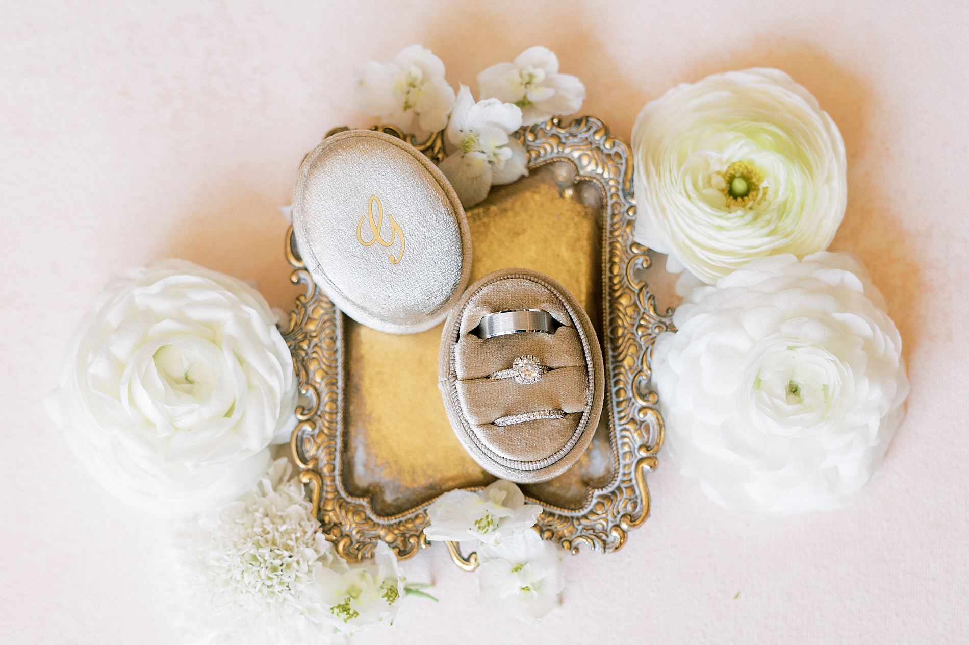 vintage wedding flat lay with rings in ring box