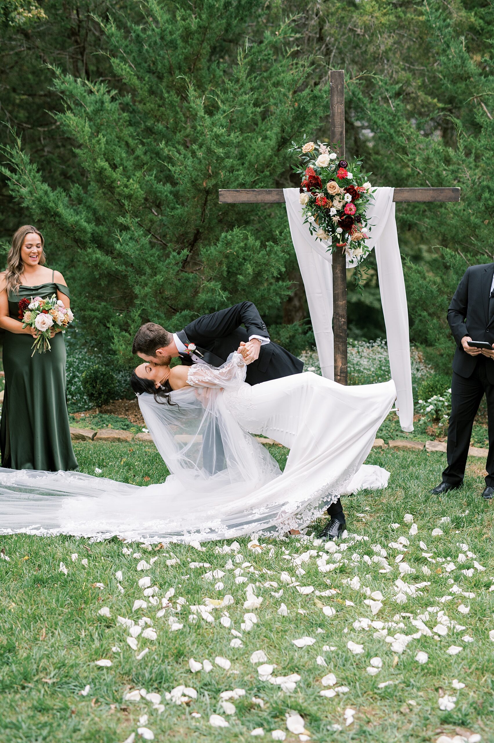 newlyweds kiss at wedding ceremony