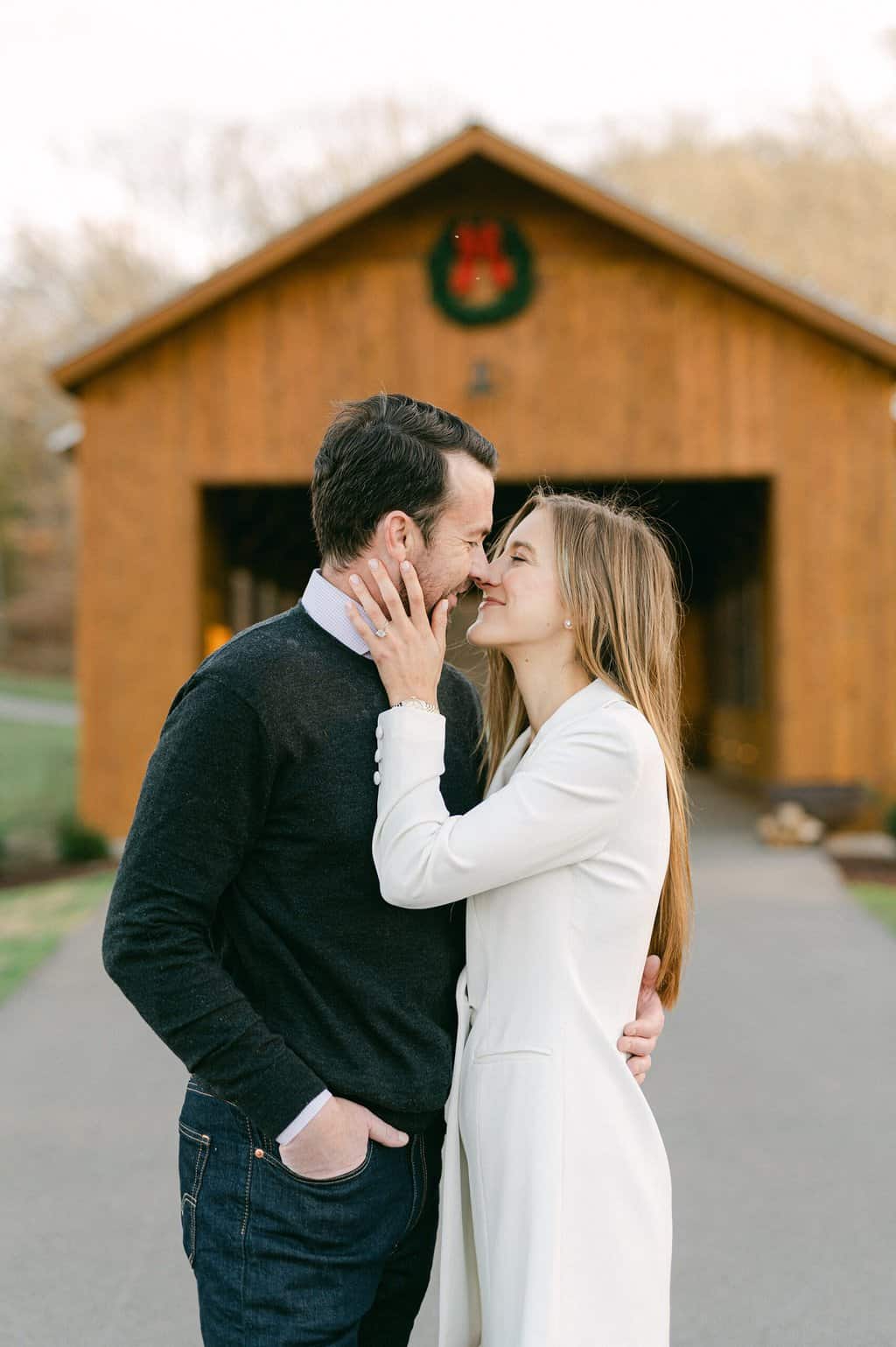 couple kiss at Southall Farm & Inn
