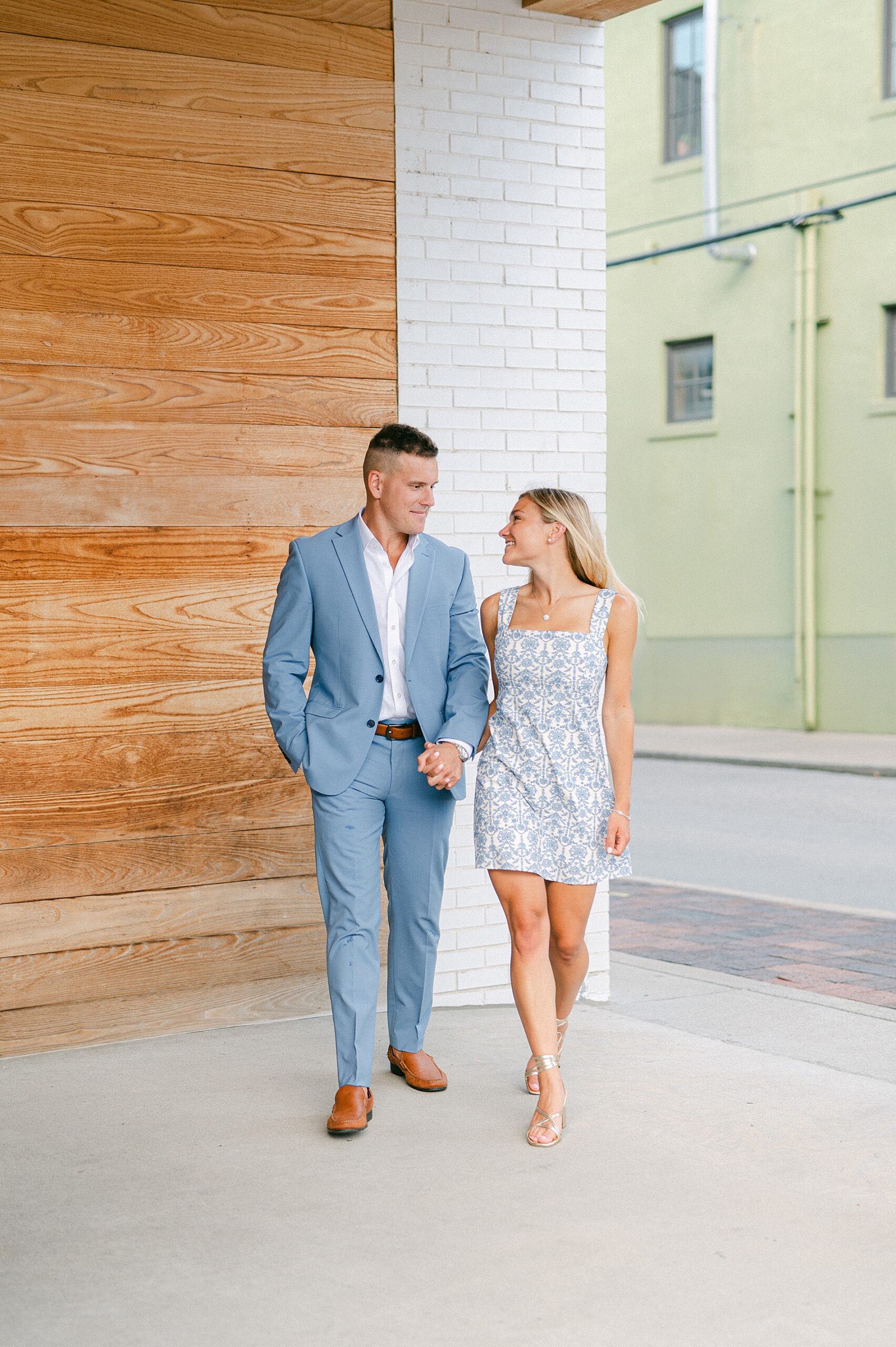 couple in light weight clothes in dusty blue color
