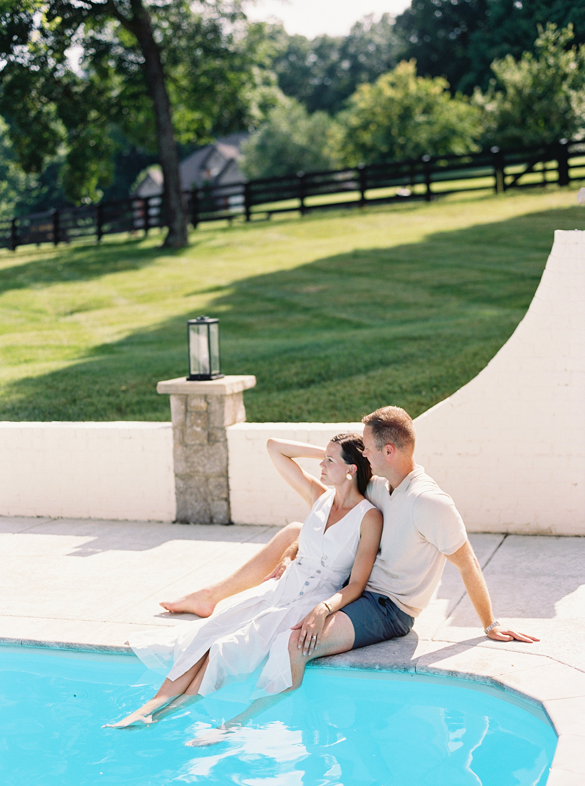 casual and classic summer engagement outfits for poolside engagement session