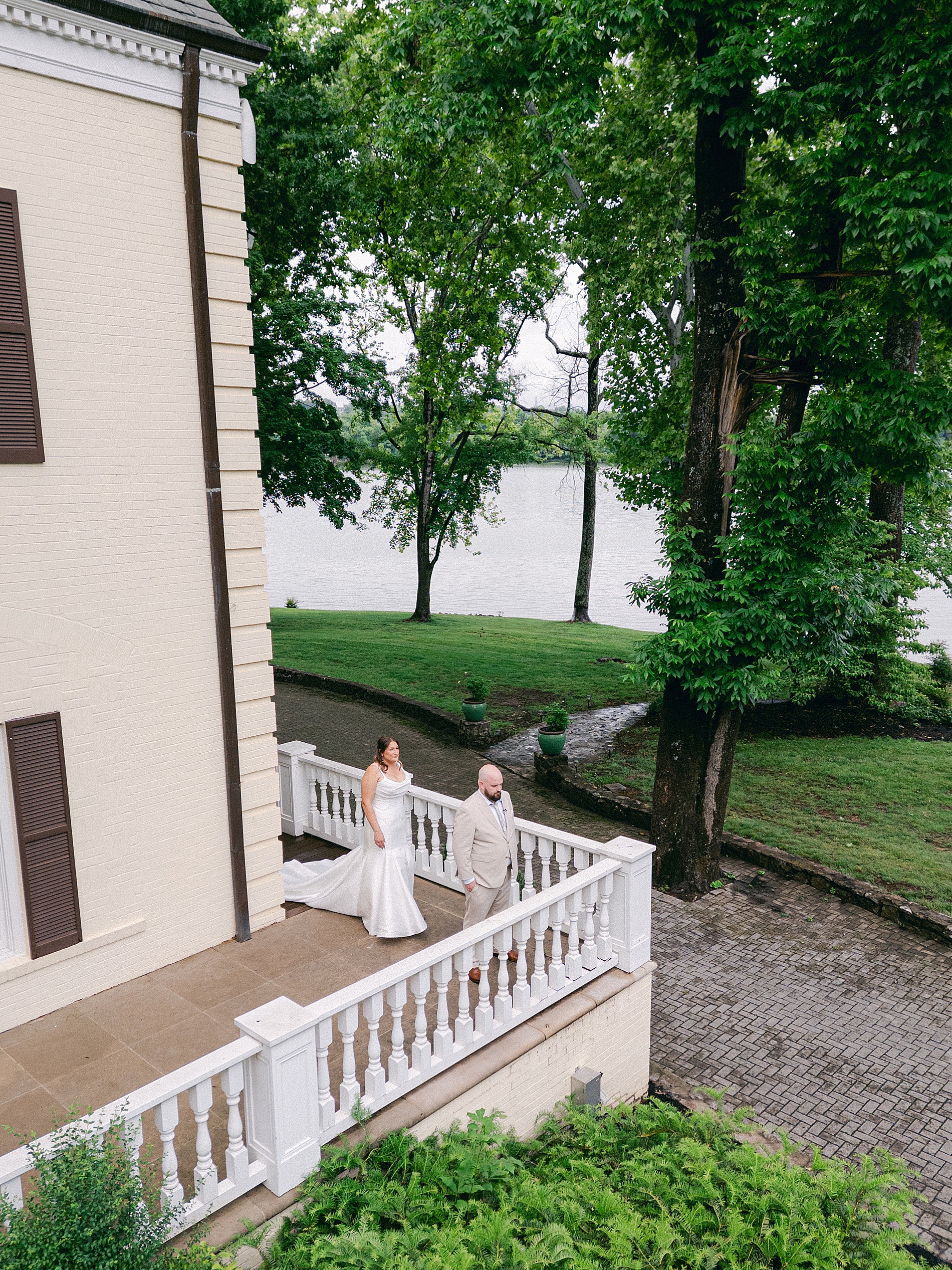 bride walks up behind groom for first look