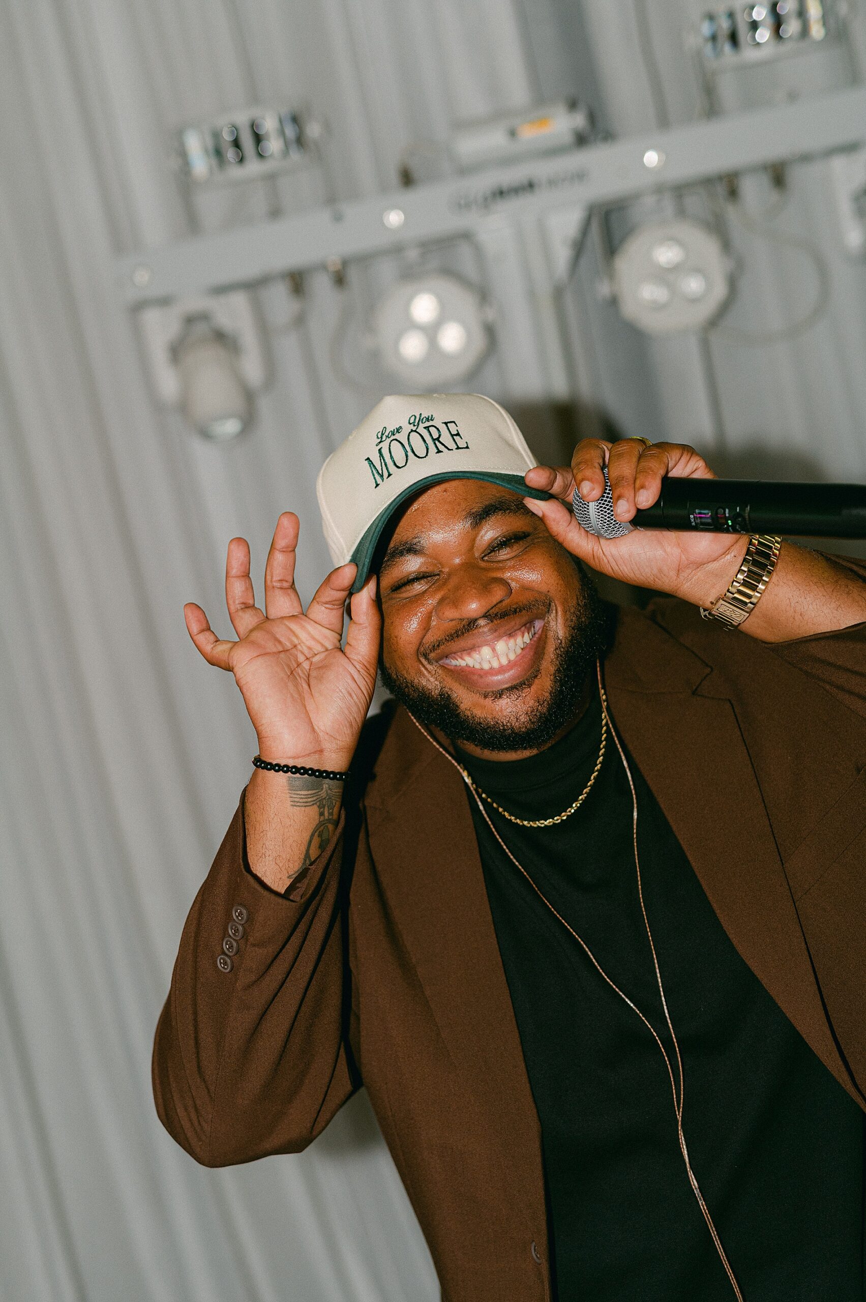 dj with custom hat on from wedding