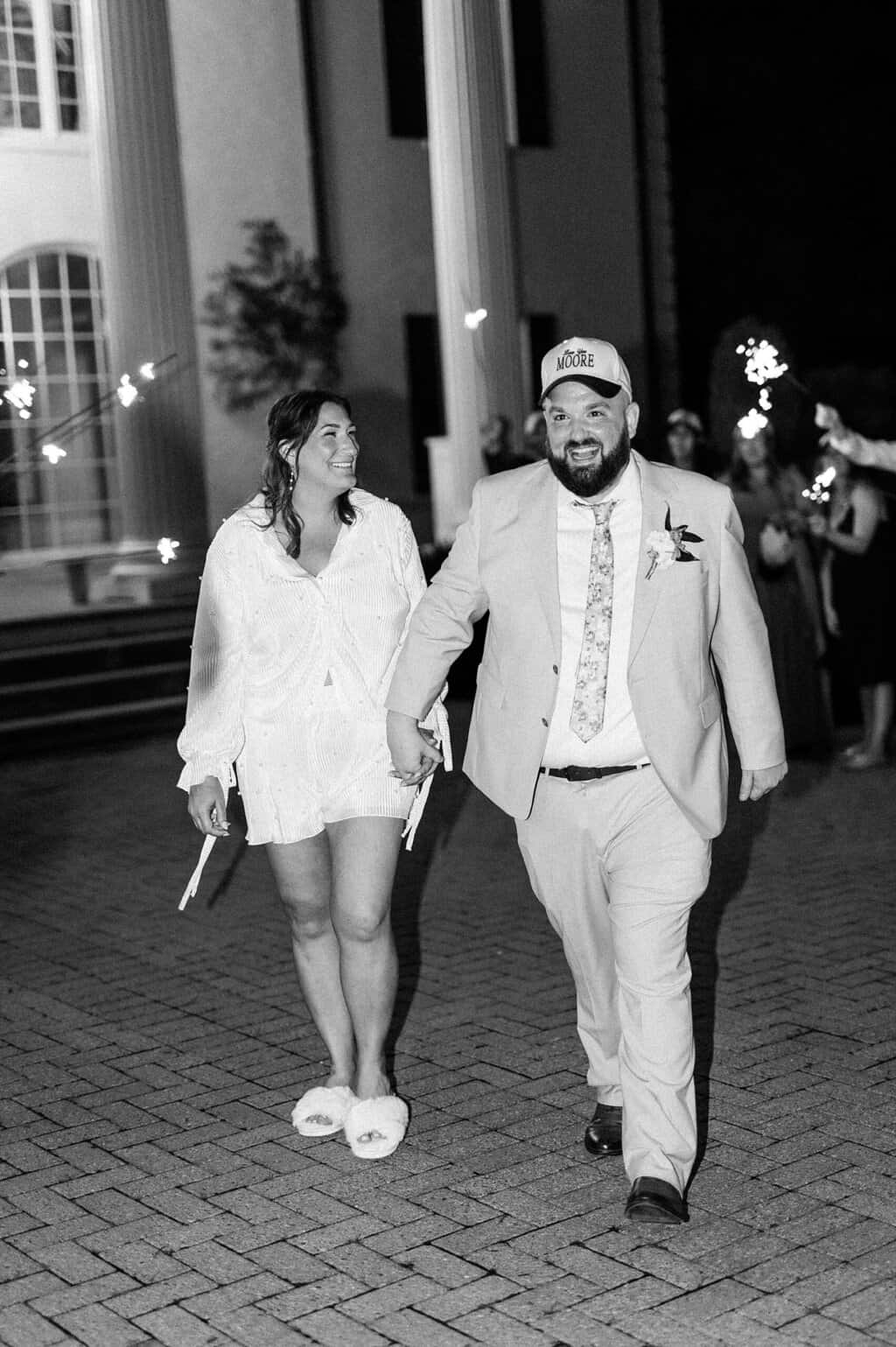 newlyweds exit Elegant Waterfront Wedding at The Estate at Cherokee Dock
